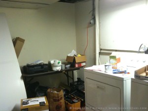 Clutter in the laundry area of the basement